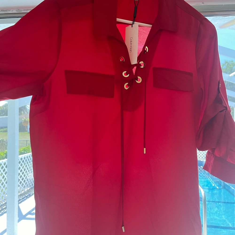 Beautiful red blouse with half sleeves